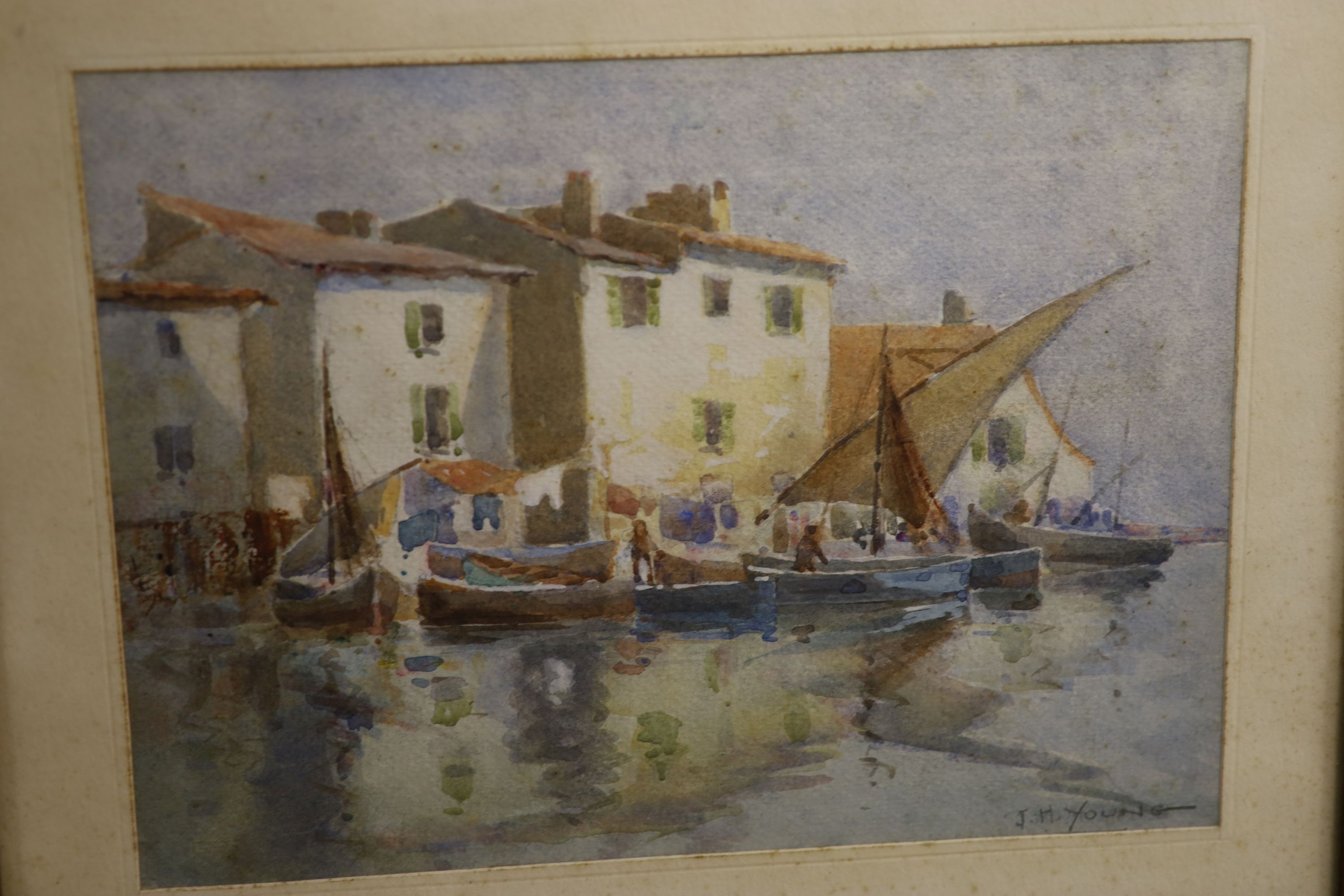 J.H. Young, pastel, View of an Italian town, signed, 34 x 39cm, together with seven other assorted works by the same hand